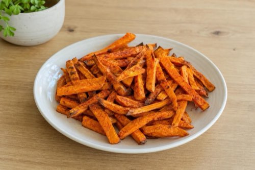 Oven-baked sweet potato fries with paprika and garlic