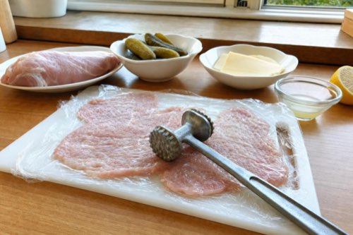 Pork rolls stuffed with pickles and cheese