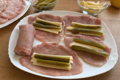 Pork rolls stuffed with pickles and cheese