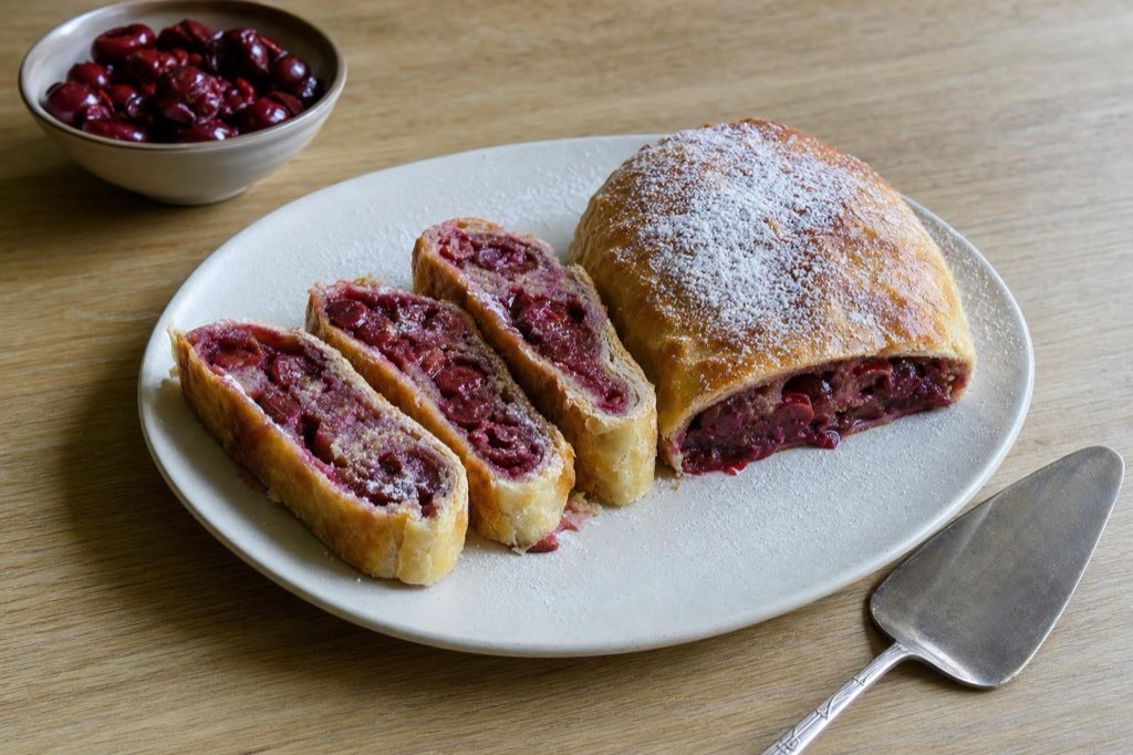 Cherry and walnut puff pastry strudel