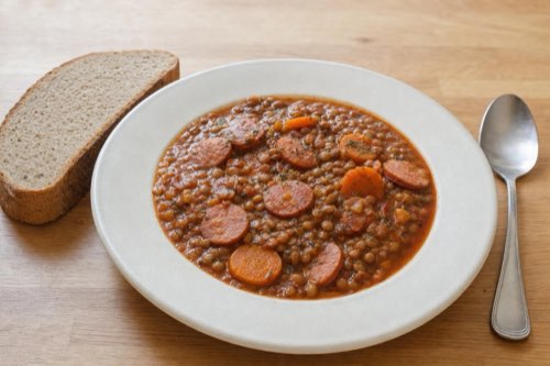 Lentil stew with smoked sausage and carrots