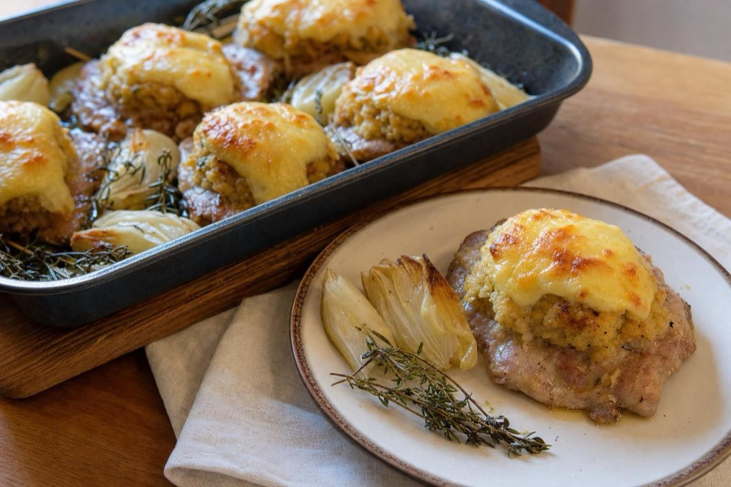Marinated pork neck with stuffing and cheese