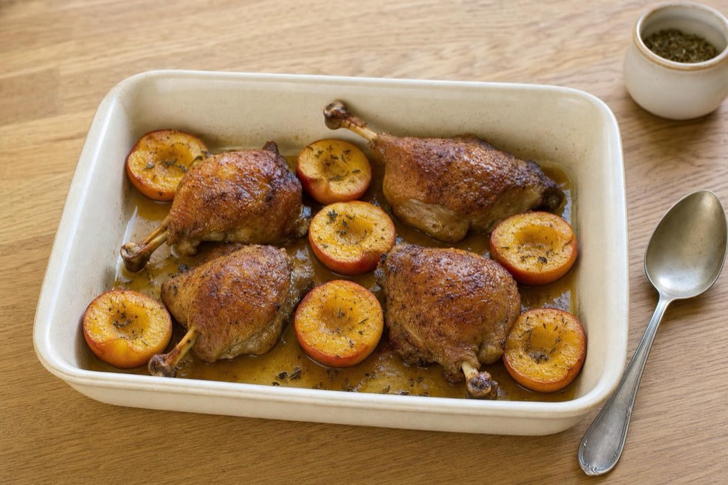 Roasted duck legs with peaches and thyme