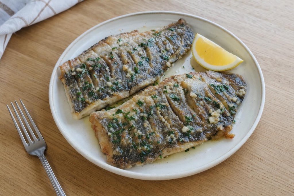 Pan-fried carp with garlic butter and lemon