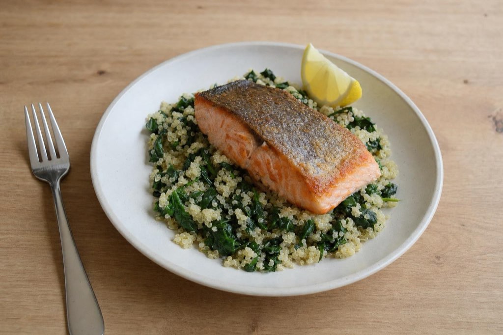 Salmon with quinoa, spinach, and lemon