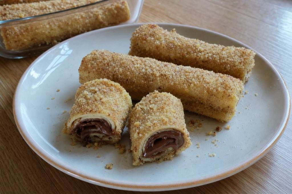 Nutella crepe rolls with walnut coating