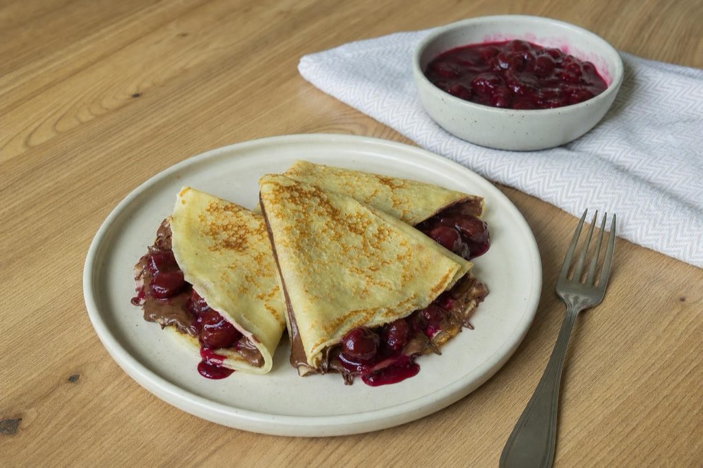 Crepes with Nutella and warm sour cherries