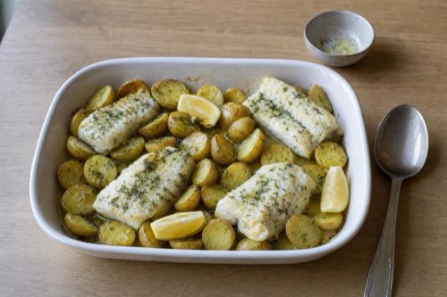Baked cod with new potatoes and dill butter