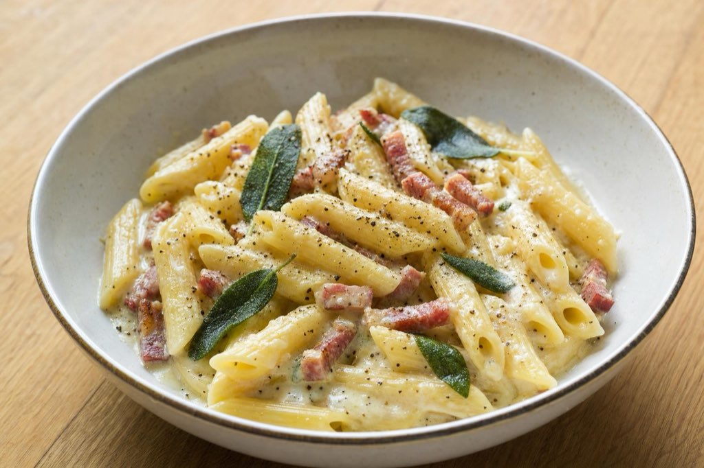 Penne with cheese sauce, pancetta and sage