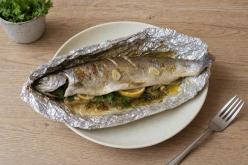 Foil-baked trout with lemon, garlic and herbs