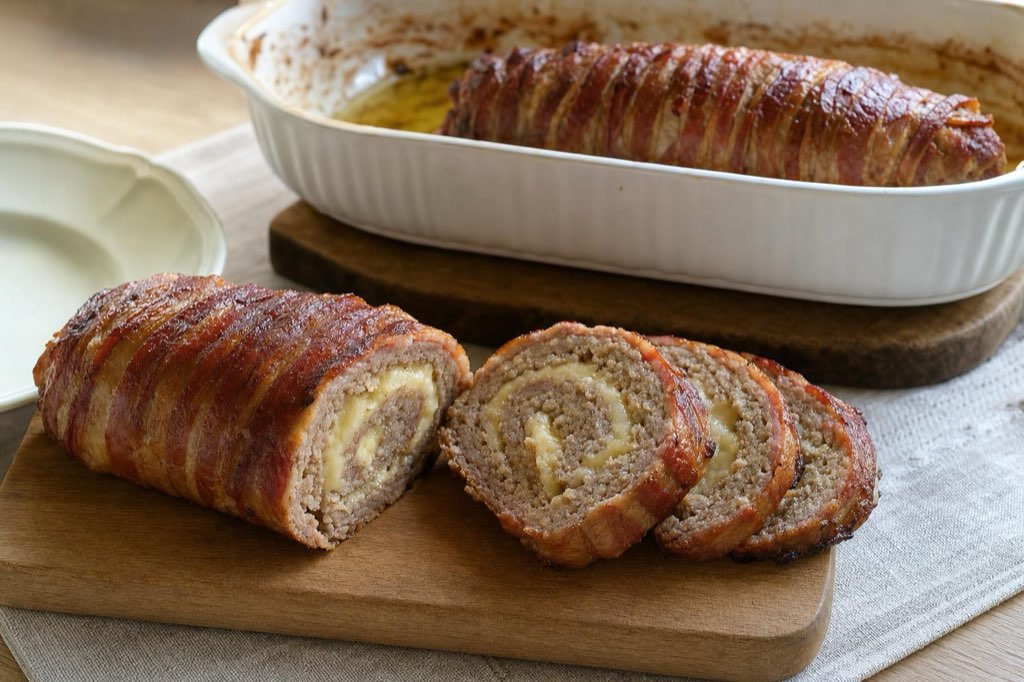 Bacon-wrapped meatloaf roll with cheese