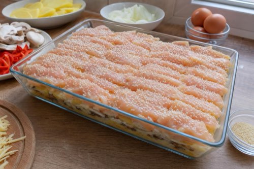 Layered chicken with potatoes and mushrooms